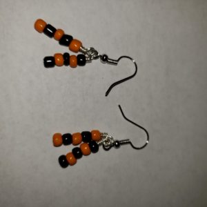 Dangle earrings; orange and black.